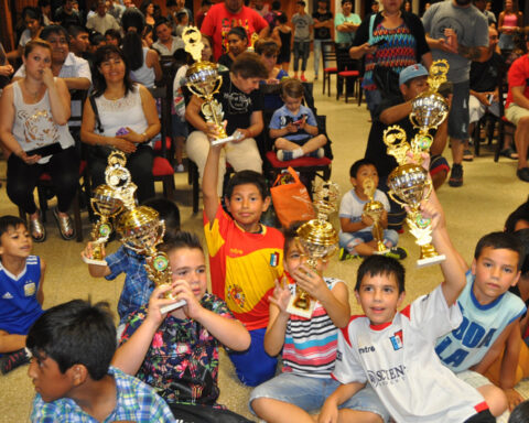 Children holding trophies